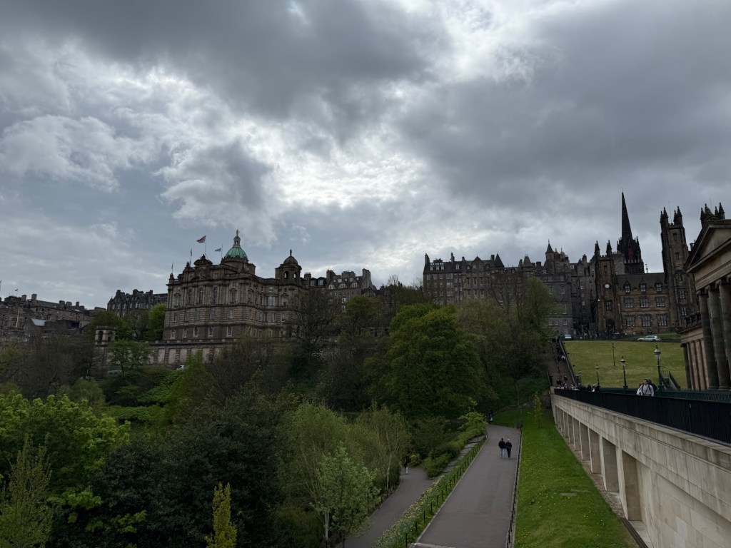 View of the Edinburgh castle and other buildings from the Princes Street park