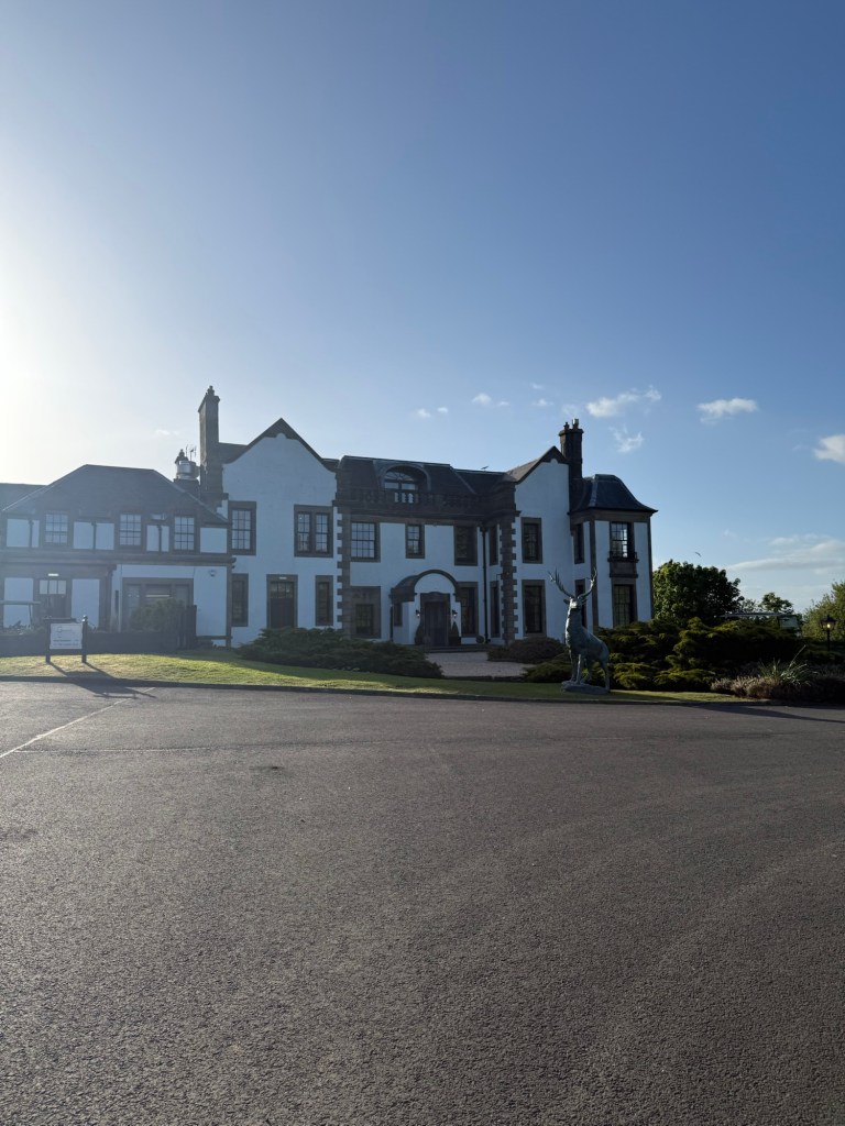 A country estate building on a sunny day