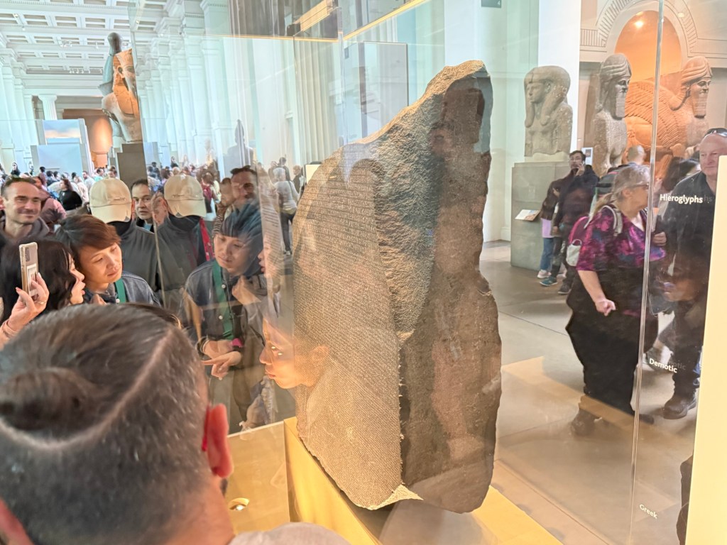 The Rosetta Stone behind a glass display case