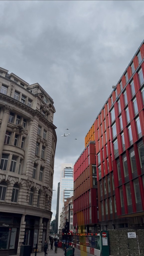 Three jets are sited in formation between London buildings